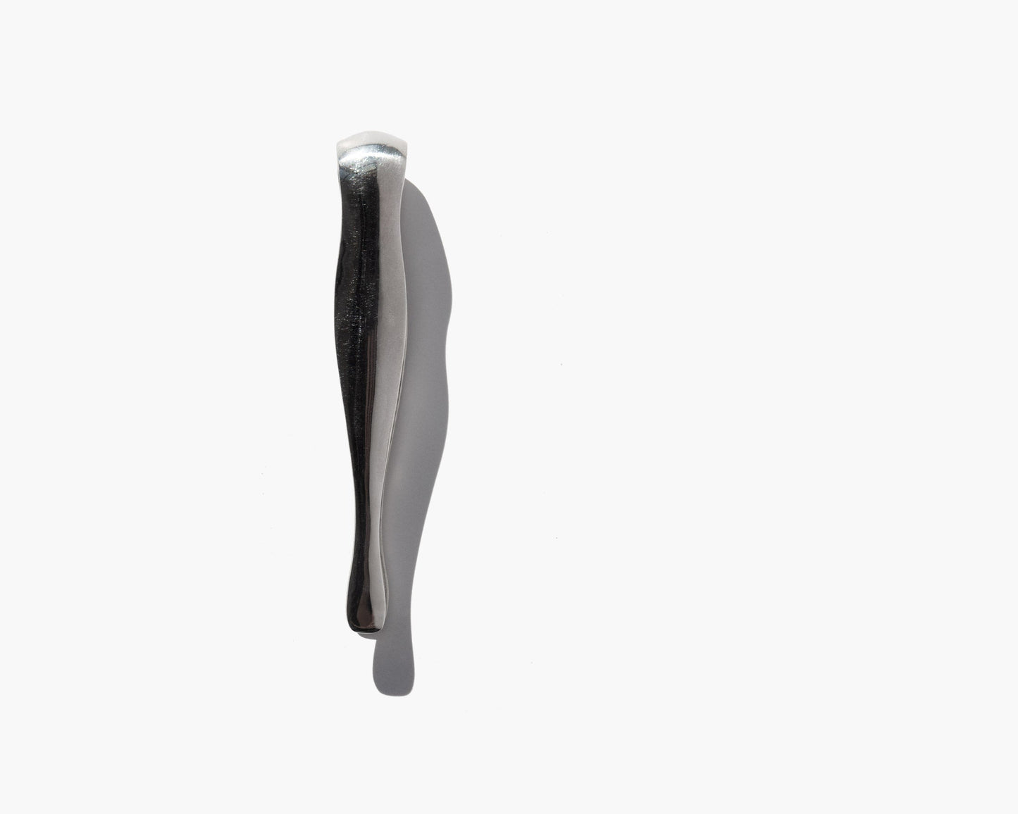 hand crafted sterling silver tweezers on white background 
