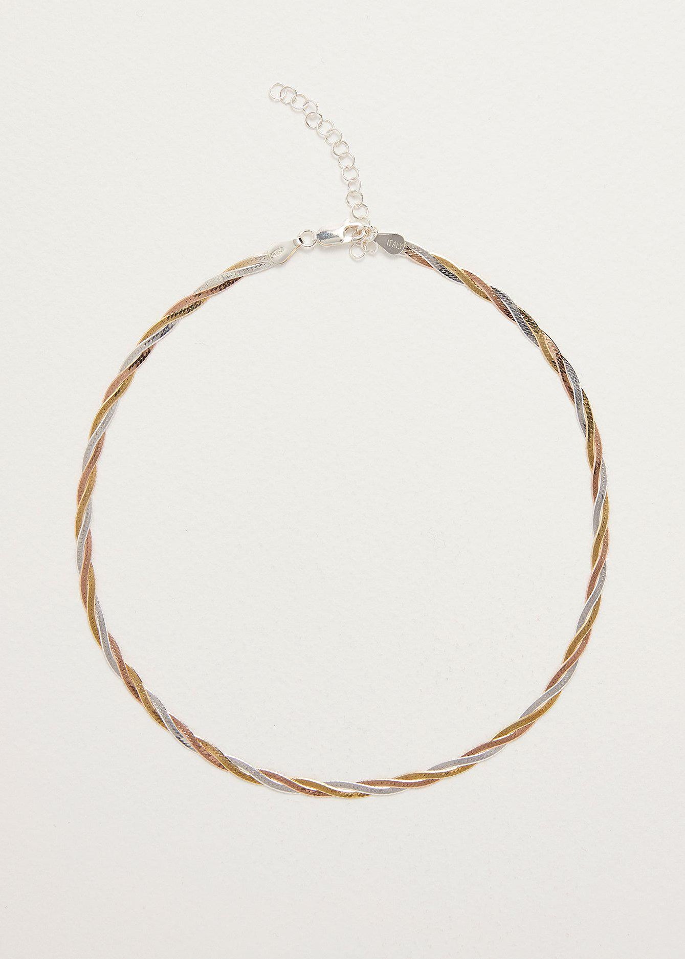 Necklace with braided design on a light gray background