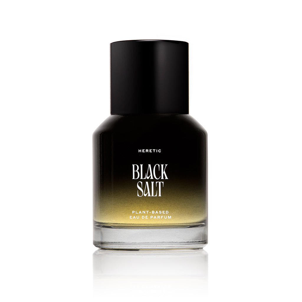 Perfume bottle labeled 'Black Salt' by Heretic on a white background