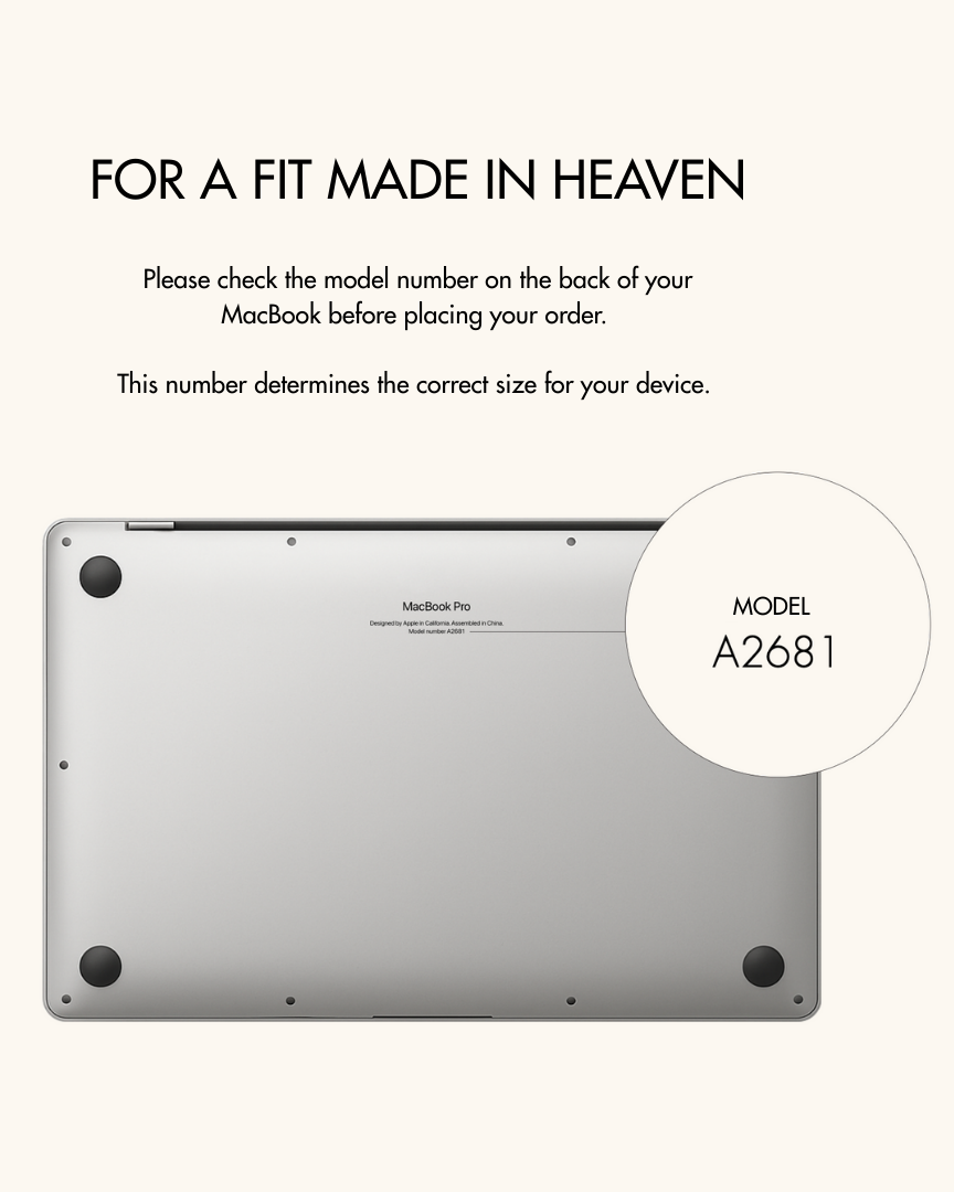 Back view of a MacBook Pro with model number A2681 on a white background