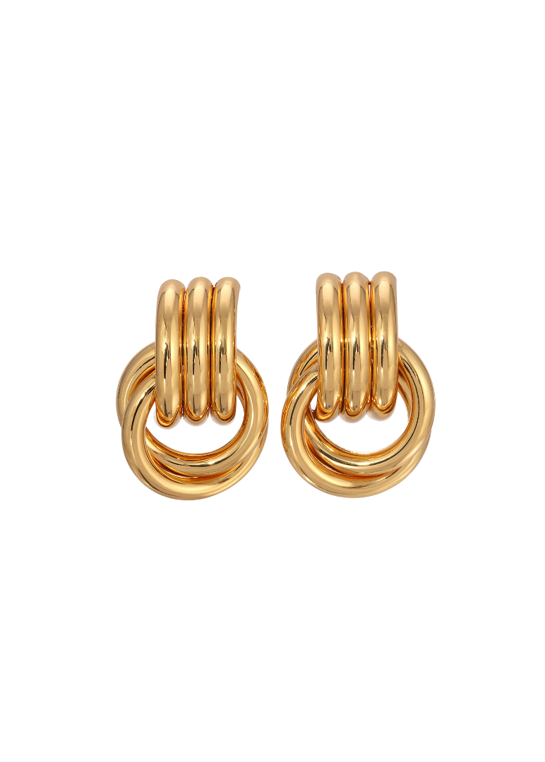Pair of gold hoop earrings on a white background
