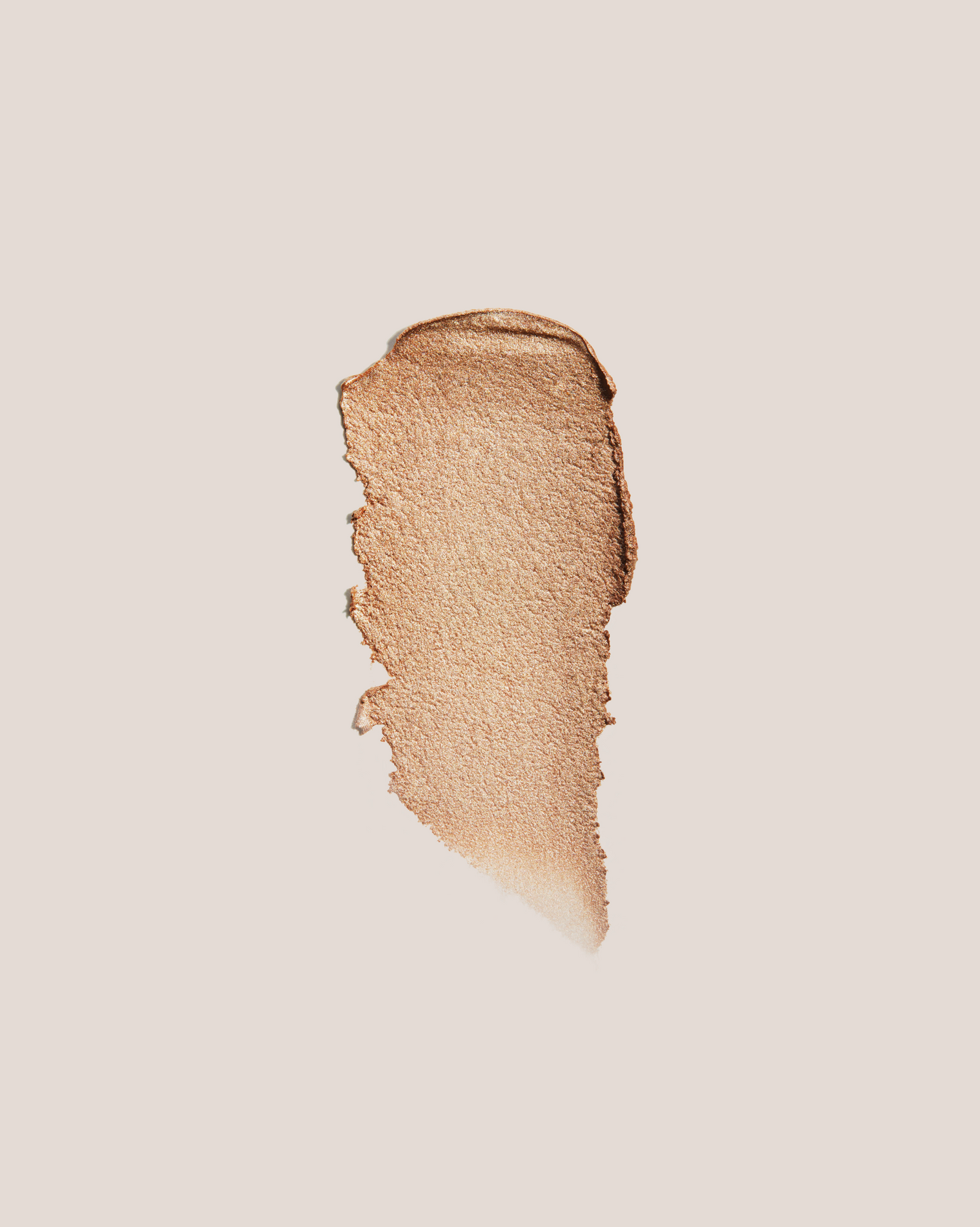 Beige makeup swatch on a light beige background