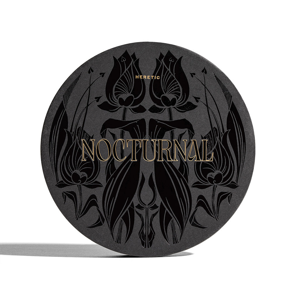 Black circular box of 'Nocturnal' perfumes samples - elegant and perfect for gifting