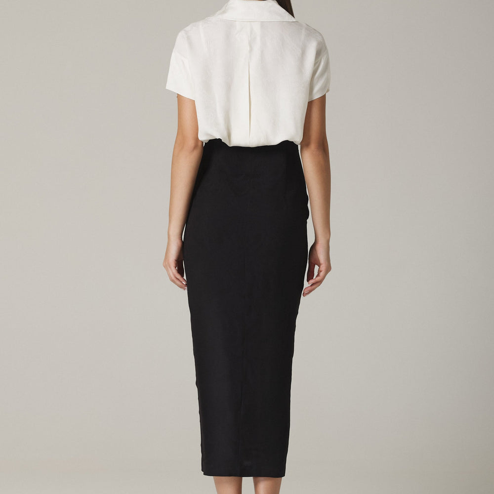 
                  
                    Full body back view of the dress in Soft White and Black viscose jacquard combo
                  
                