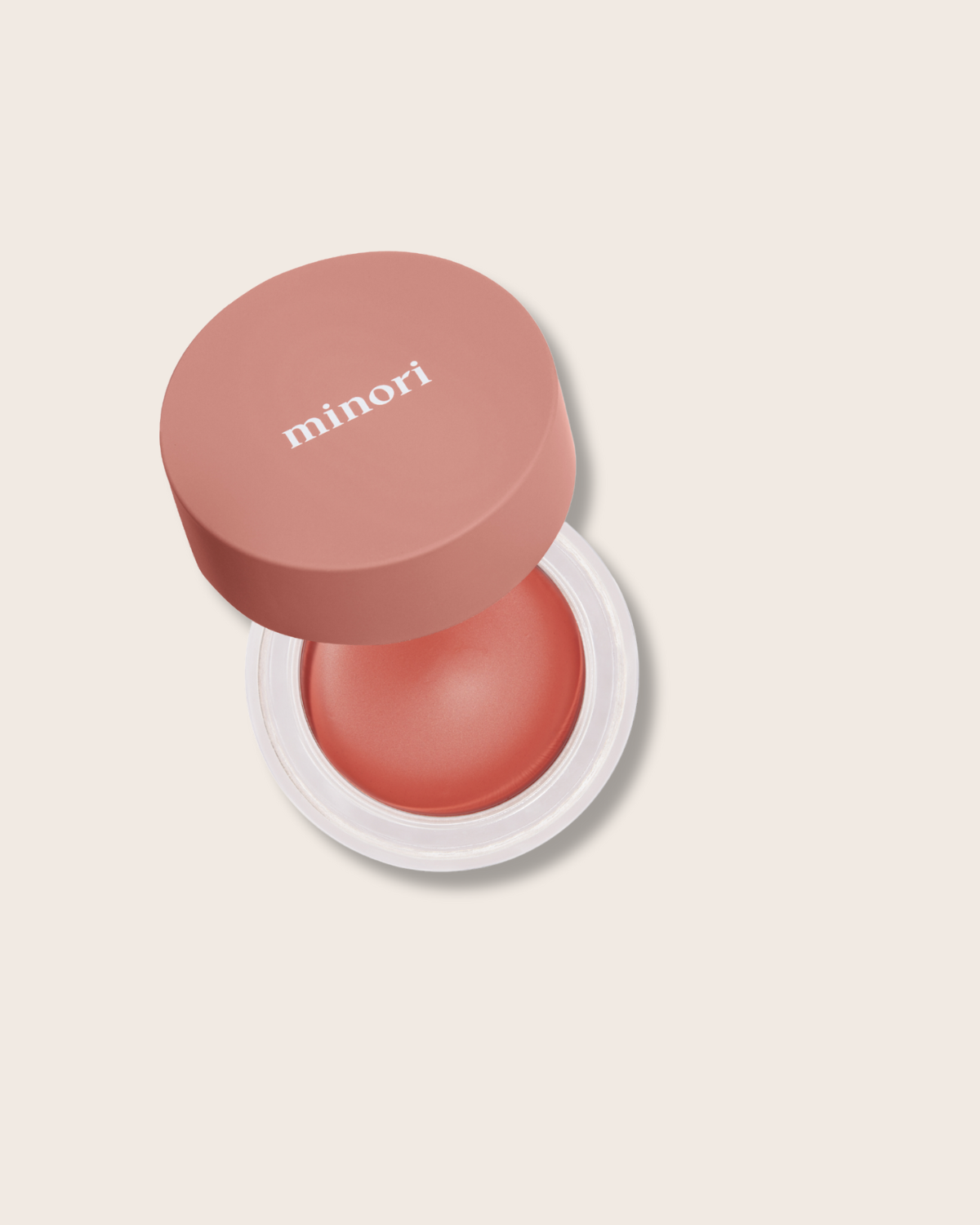 Minori blush compact on a light beige background
