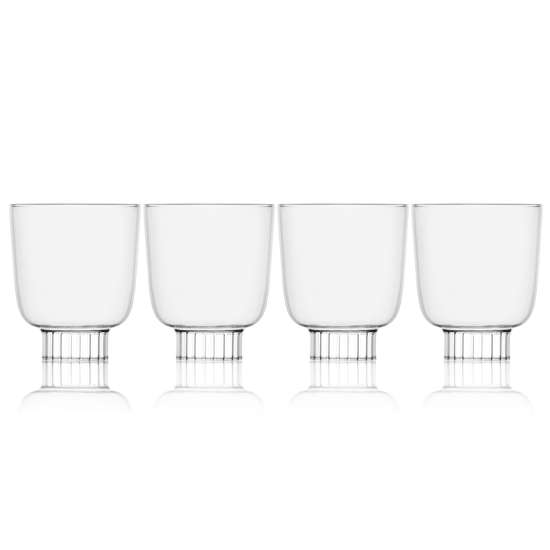 Clear cocktail glasses on white background - set of 4