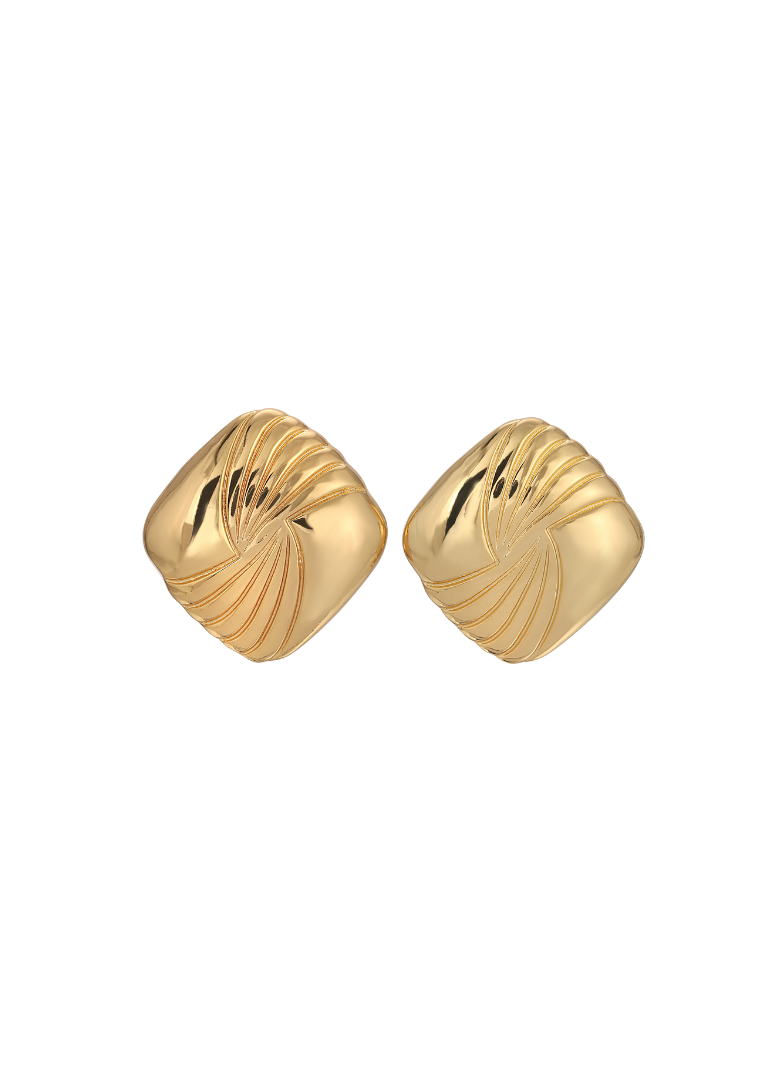 Pair of gold earrings on a white background