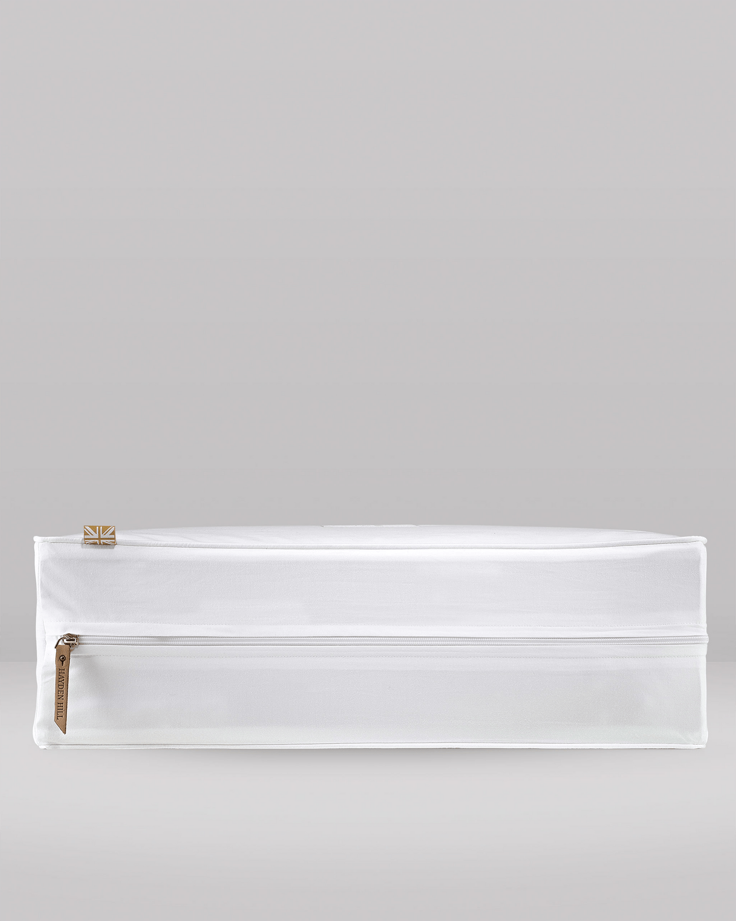 White organic cotton cube for clothing storage and zipper closure - side view. 