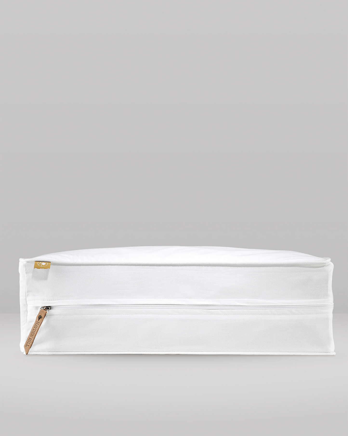 Side view of the cotton cube and zipper closure