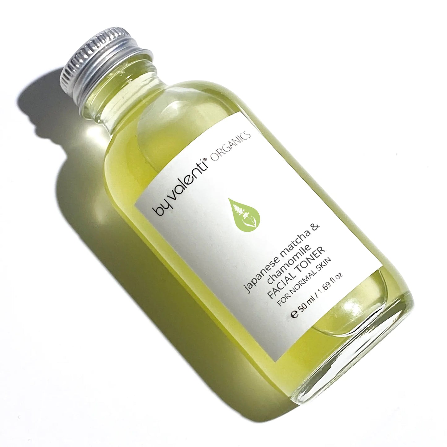 Bottle of By Valenti Organics facial toner on a white background