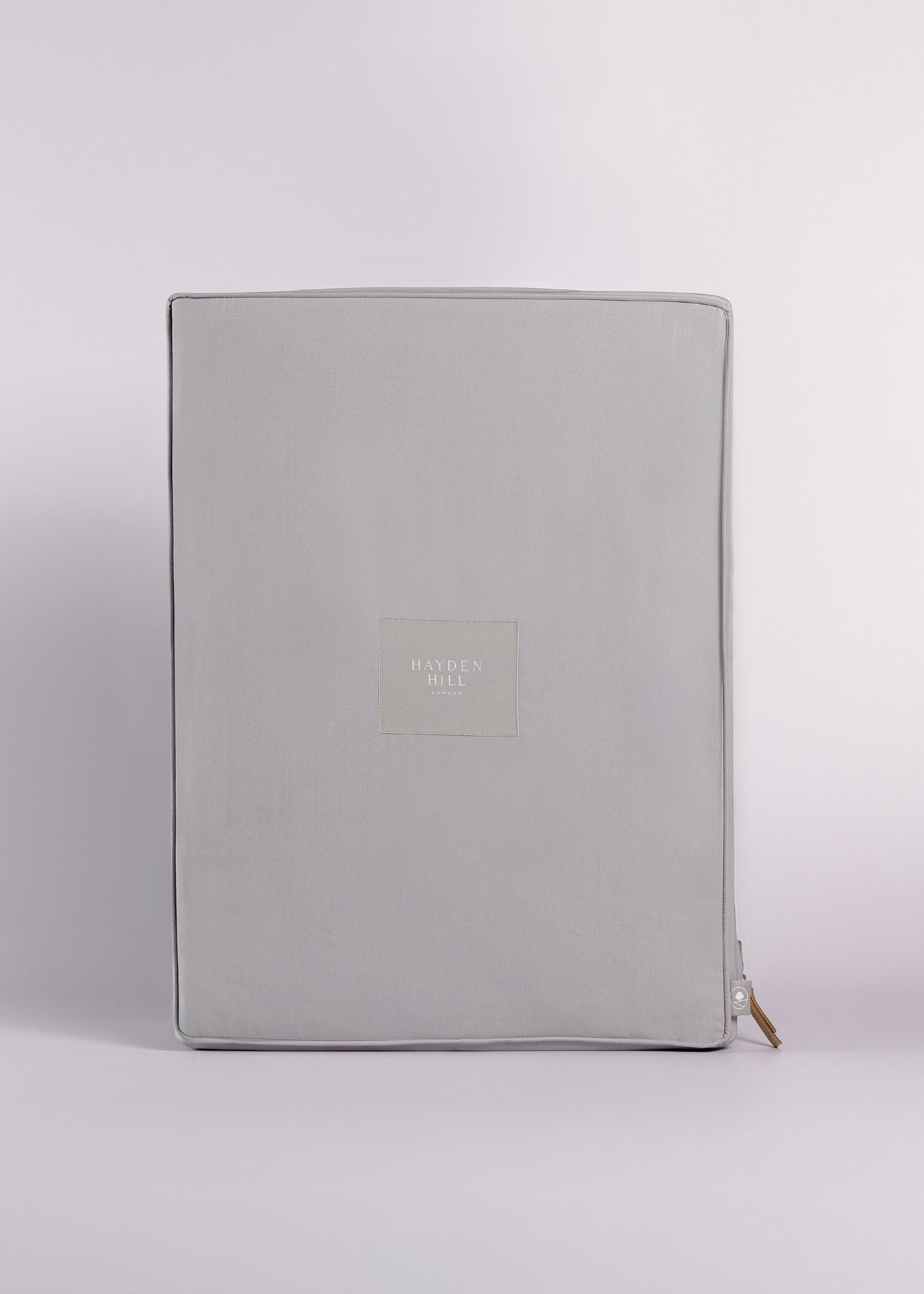 Hayden Hill garment storage bag in grey on a light grey background