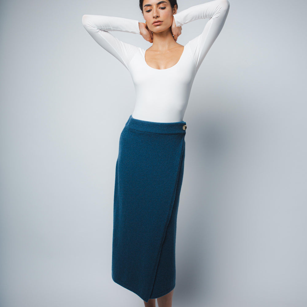 
                  
                    MILA CASHMERE WRAP SKIRT IN PEACOCK
                  
                