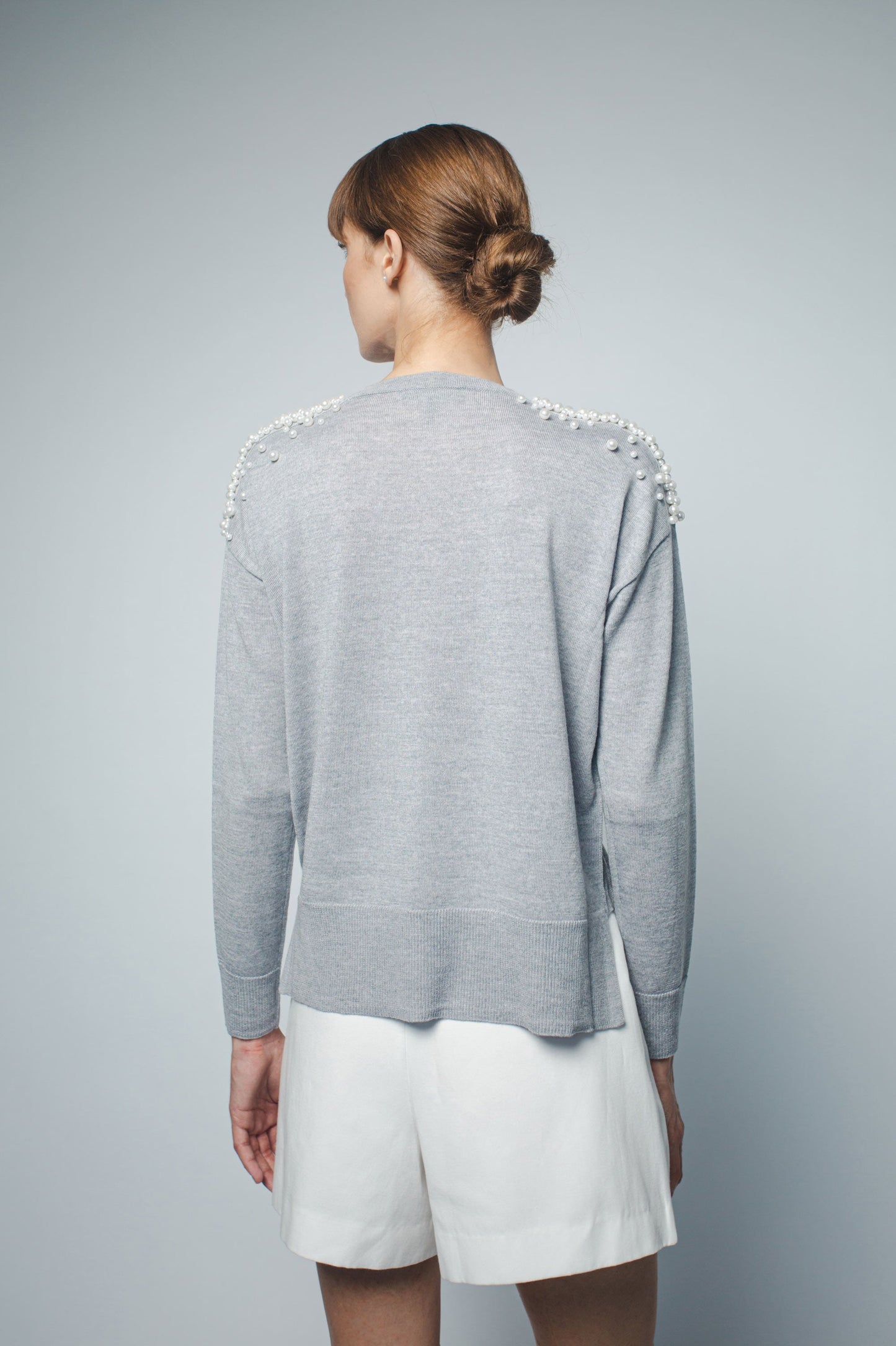 
                  
                    KATHRYN RELAXED FIT PULLOVER WITH PEARL BEADING IN HEATHER GREY
                  
                