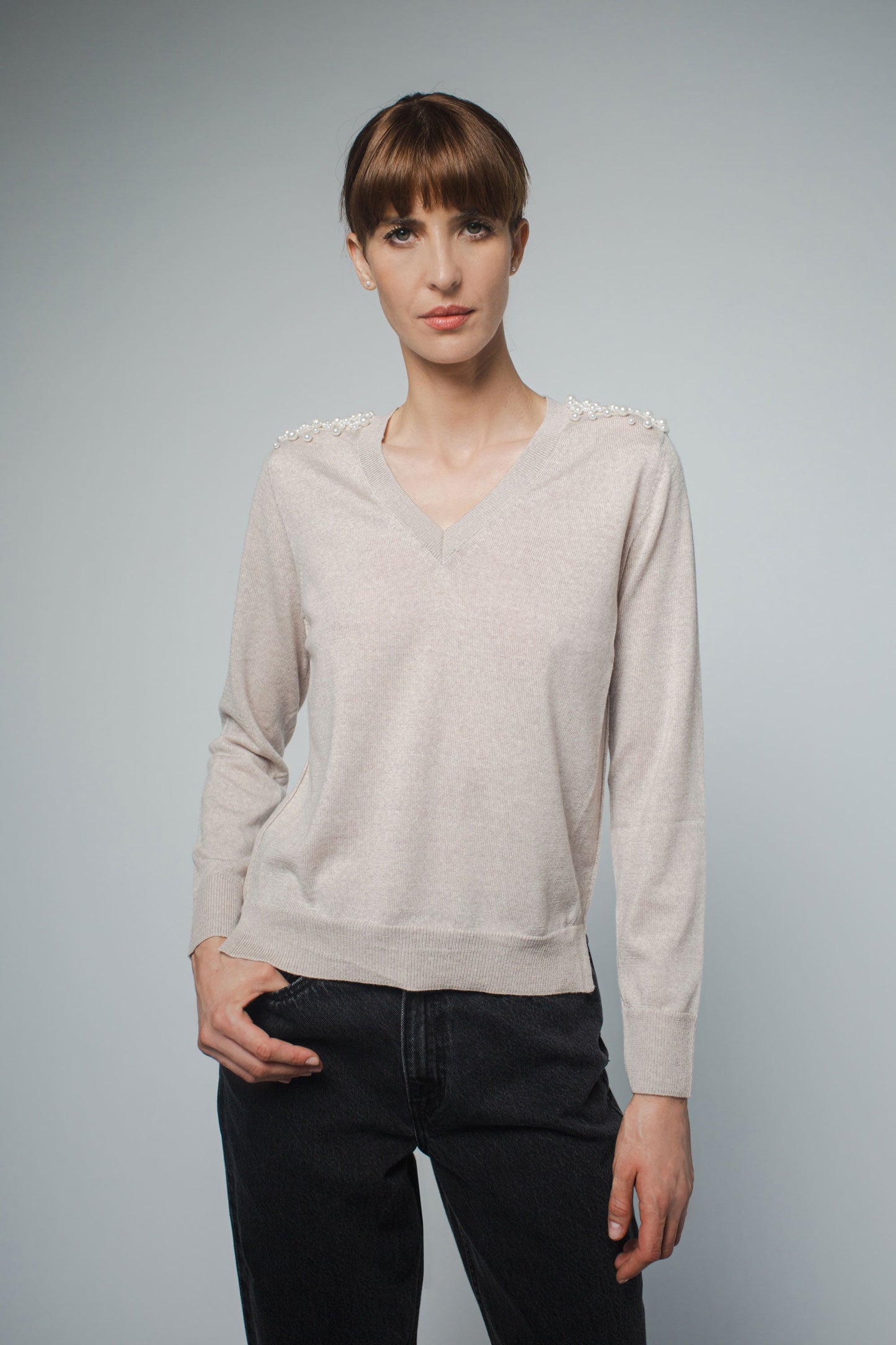 
                  
                    JULIA V-NECK PULLOVER WITH PEARL BEADING IN MARCONA
                  
                