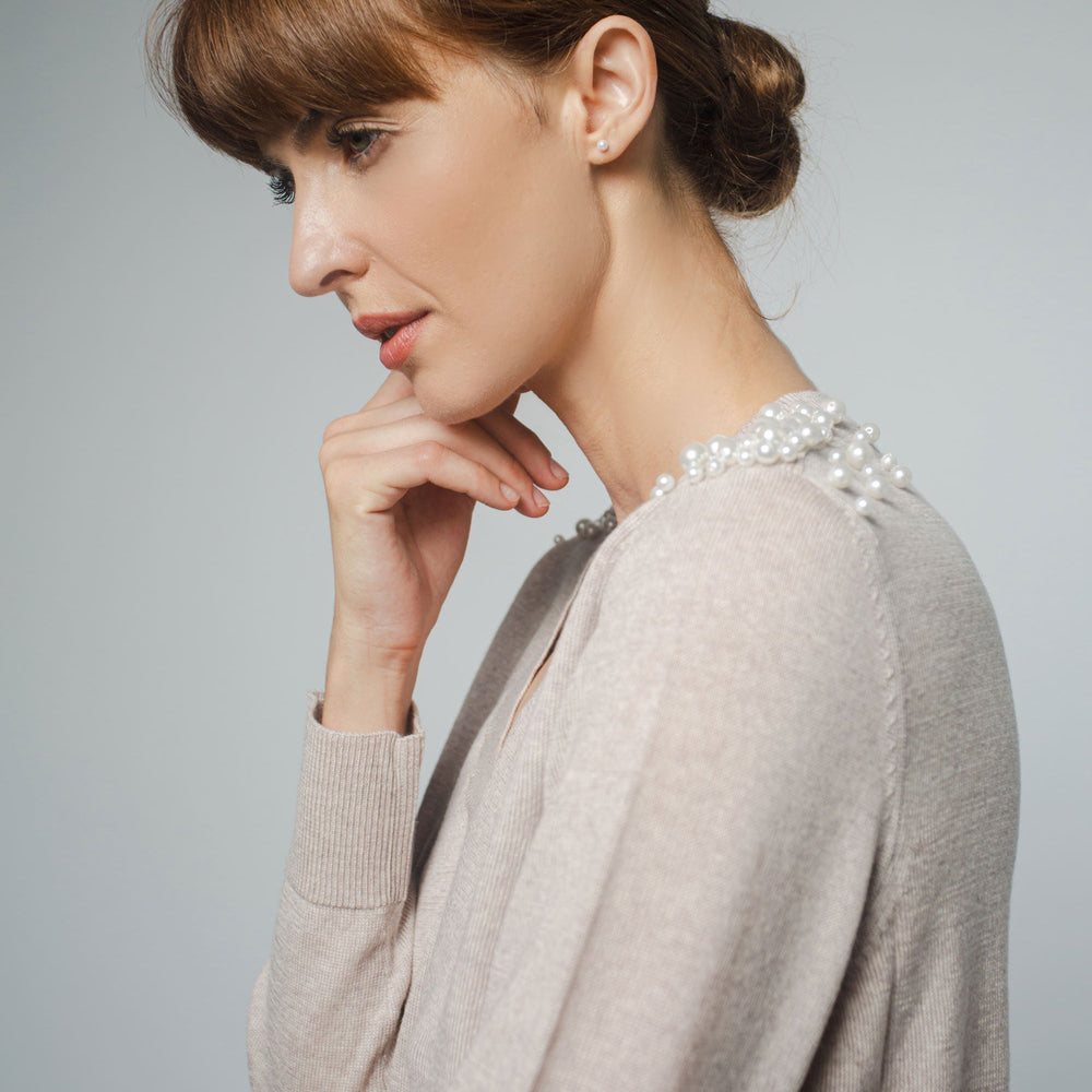 
                  
                    JULIA V-NECK PULLOVER WITH PEARL BEADING IN MARCONA
                  
                