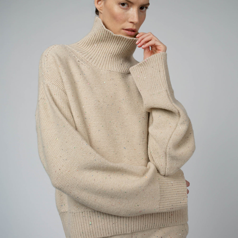 
                  
                    CIO CASHMERE RELAXED FIT SWEATER IN BEIGE SPARKLE
                  
                